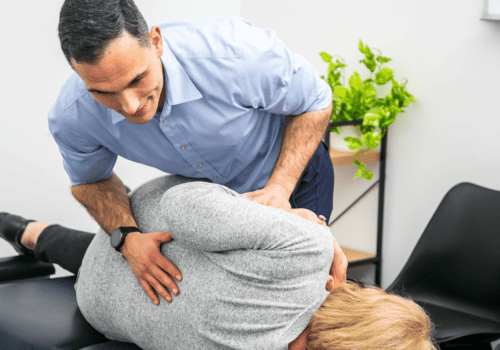 Geelong chiropractor performing manual adjustment to lower lumbar spine